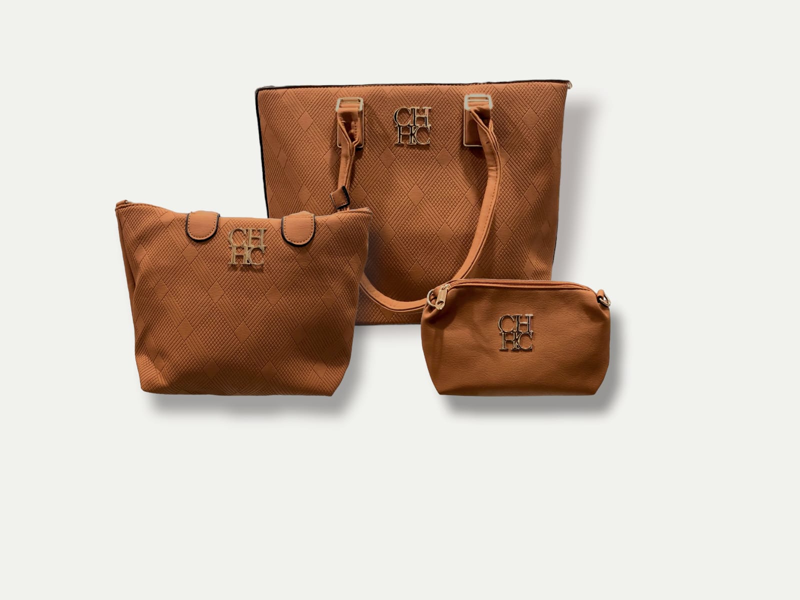 JUEGO DE CARTERA DE DAMA - CAROLINA HERRERA.